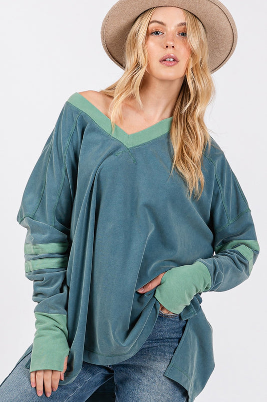 long sleeve v-neck t-shirt with jersey stripes on sleeve and thumbholes in teal front view