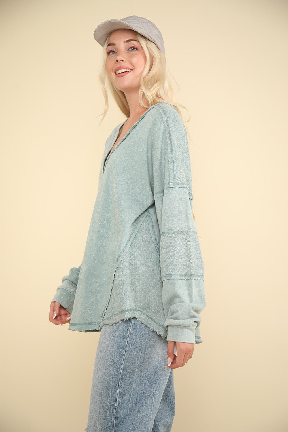 woman wearing long sleeve lounge top in peppermint green