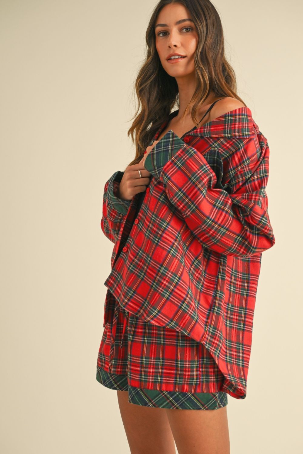 woman wearing red and green plaid lounge set