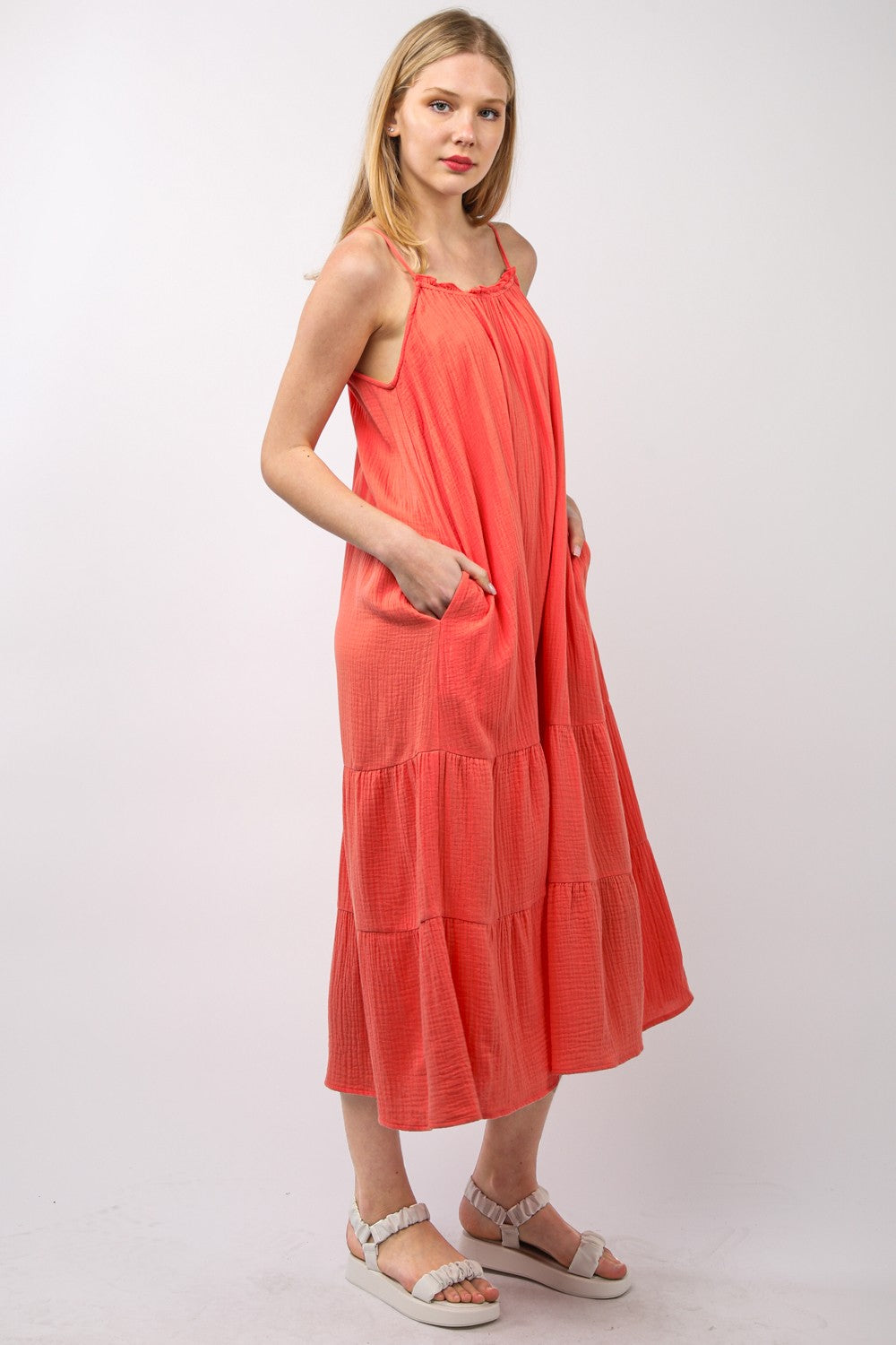 woman wearing cotton resort dress side view