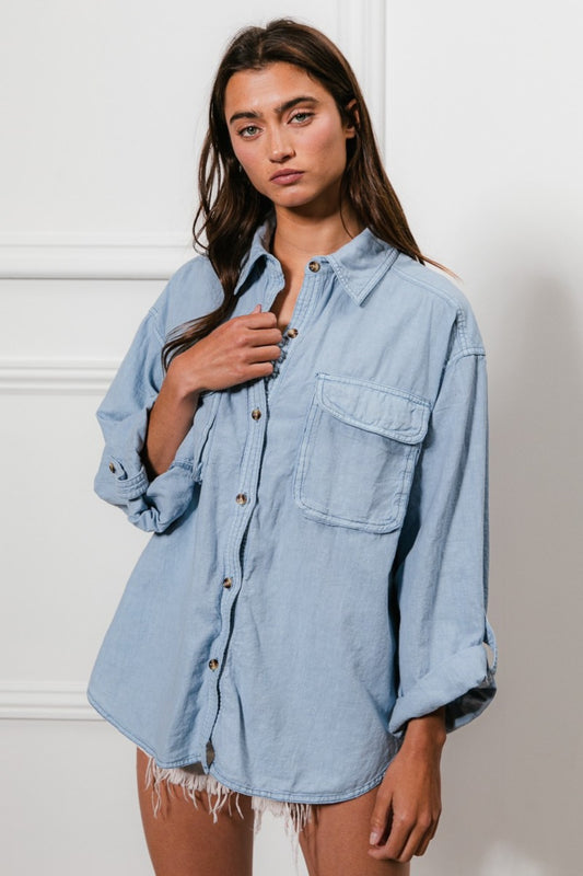 woman wearing relaxed fit denim shirt