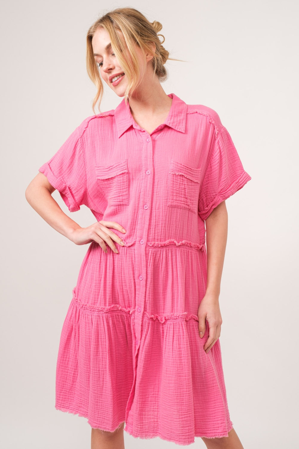 woman wearing cotton shirt dress in pink front view