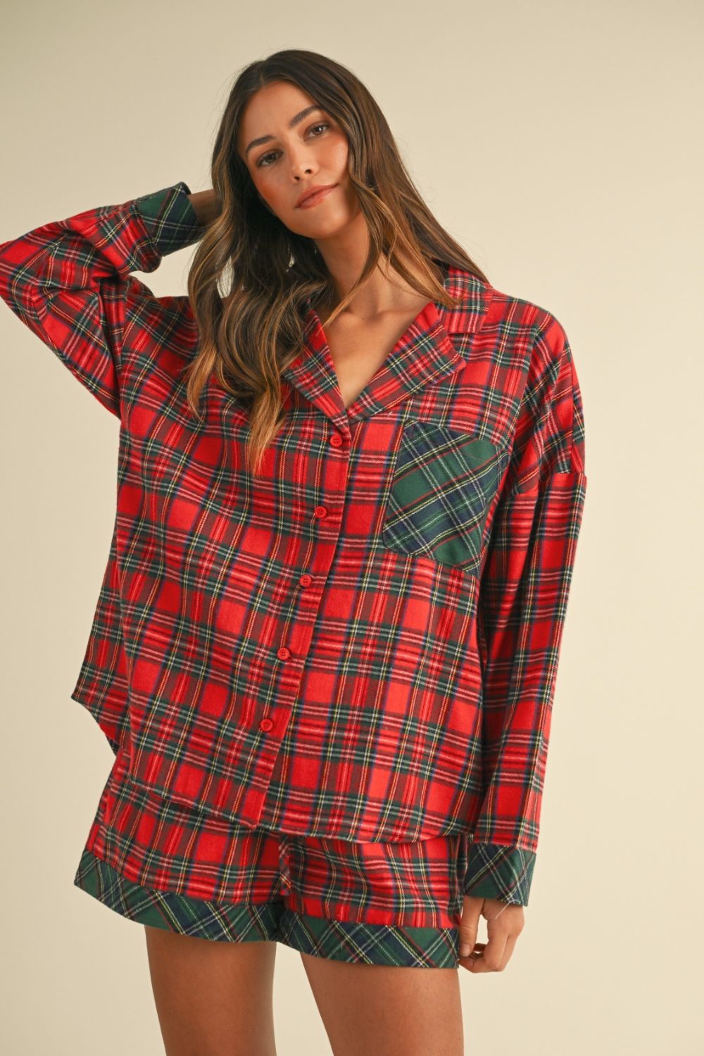 woman wearing red and green plaid lounge set