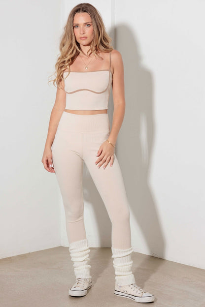 woman wearing neutral activewear set