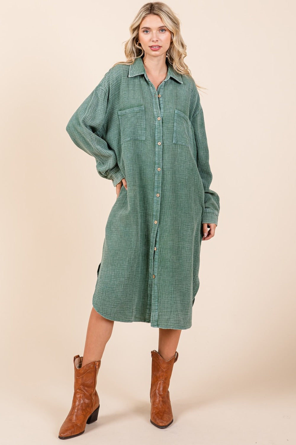 woman wearing cotton midi shirt dress in fern green front view