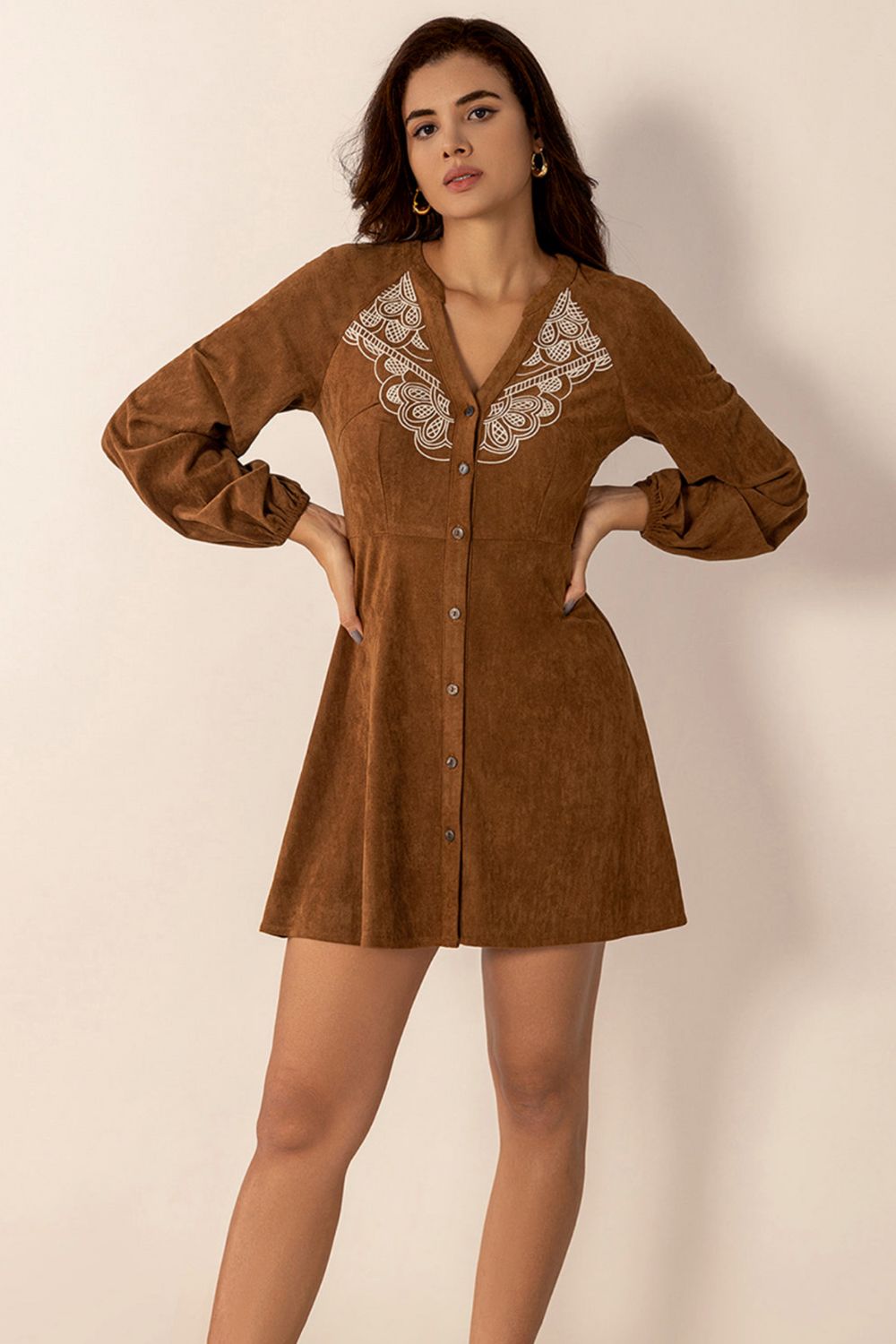 woman wearing faux suede mini dress in brown