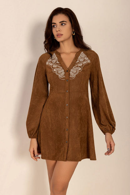 woman wearing faux suede mini dress in brown