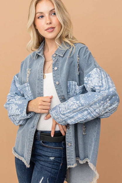 woman wearing high-low denim shacket with paisley pattern