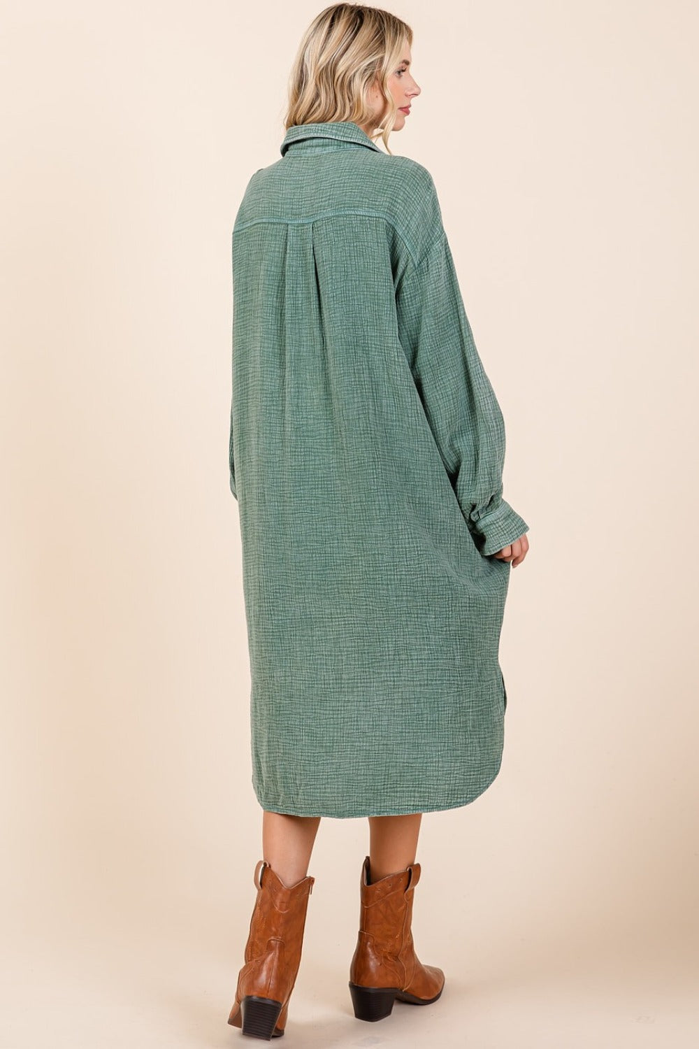 woman wearing cotton midi shirt dress in fern green back view