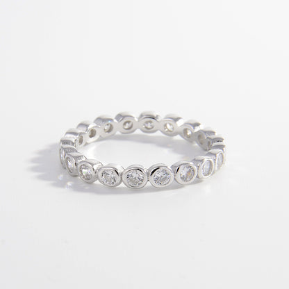 bezel set band with round stones in sterling silver