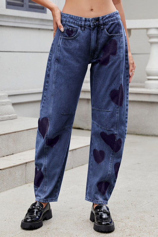 woman wearing mid rise jeans with hearts