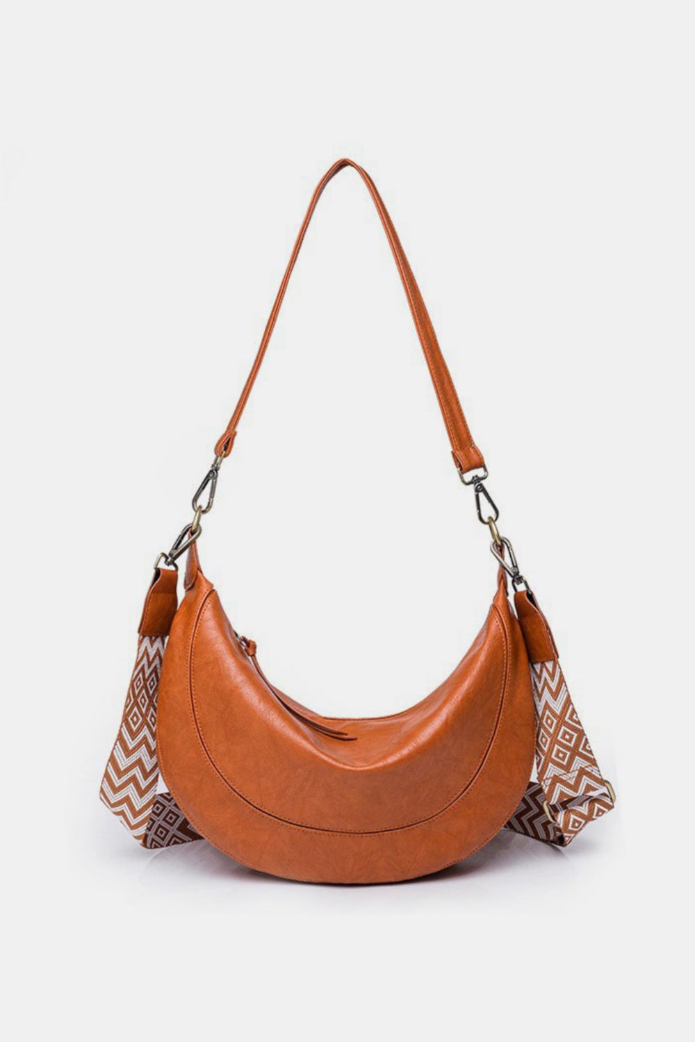 crossbody crescent bag in cognac