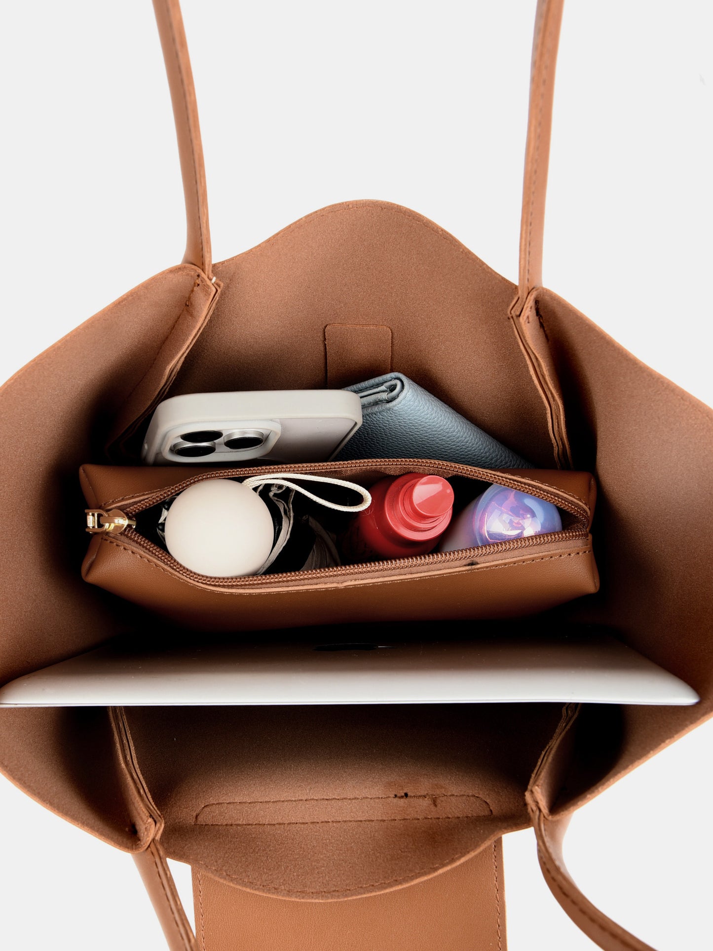 shoulder bag with removable pouch in cognac brown interior view