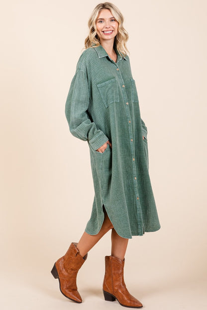 woman wearing cotton midi shirt dress in fern green side view