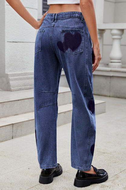 woman wearing mid rise jeans with hearts