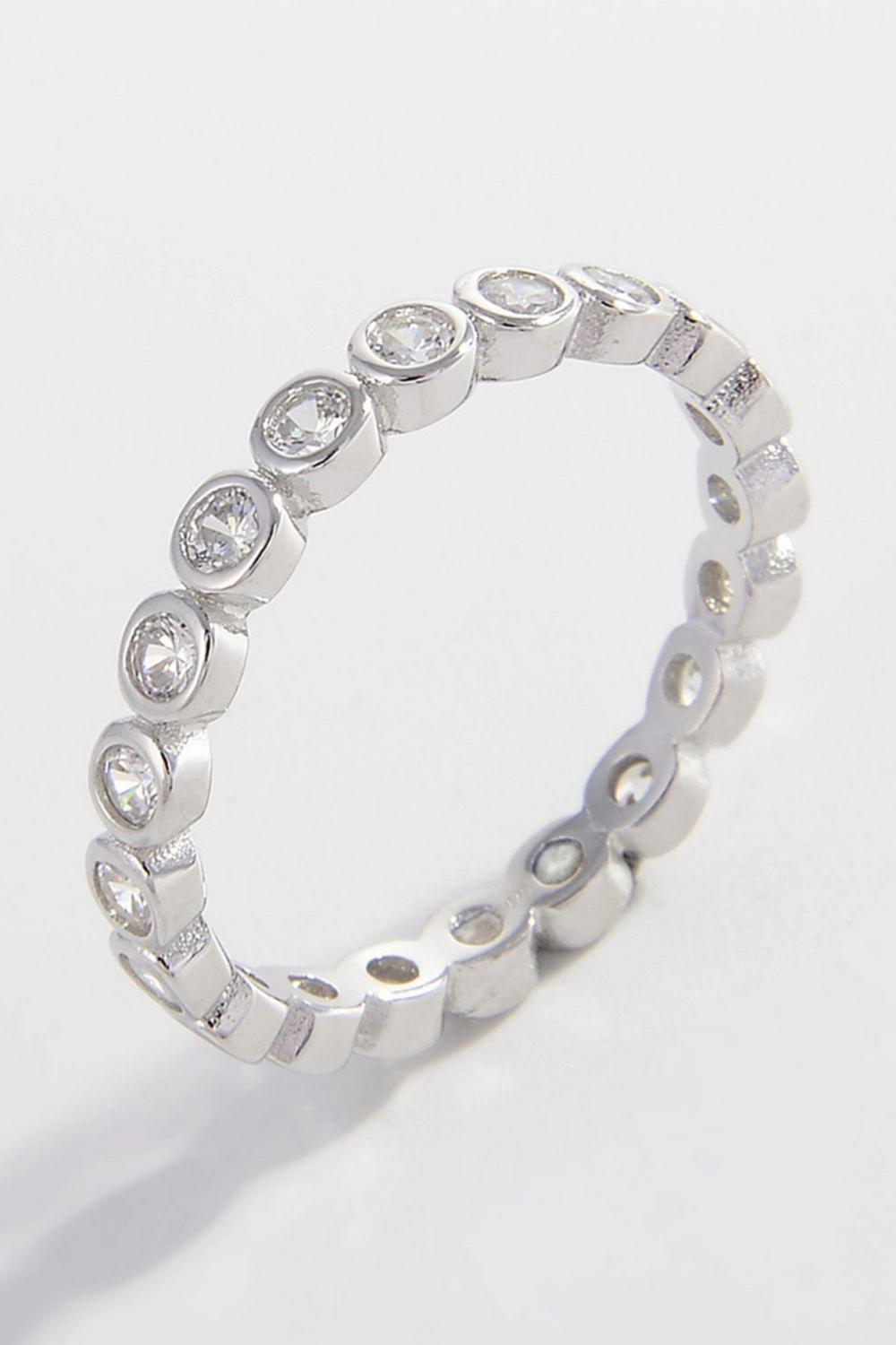 bezel set band with round stones in sterling silver