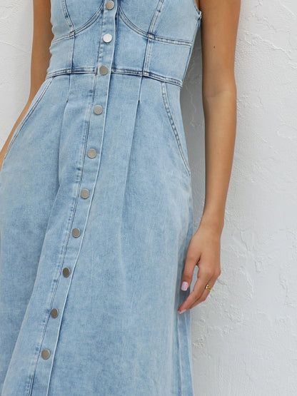 woman wearing denim corset dress close up view