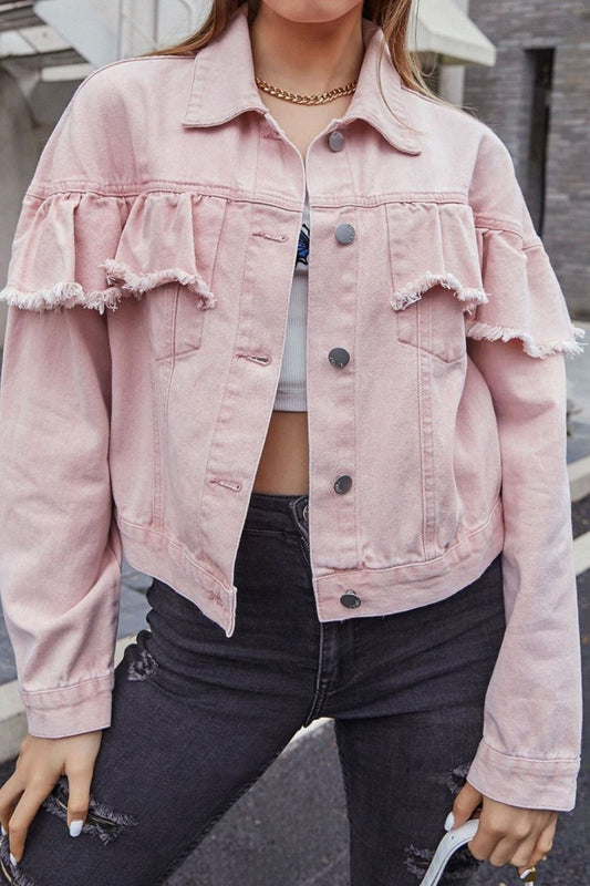 woman wearing pink denim jacket with ruffle