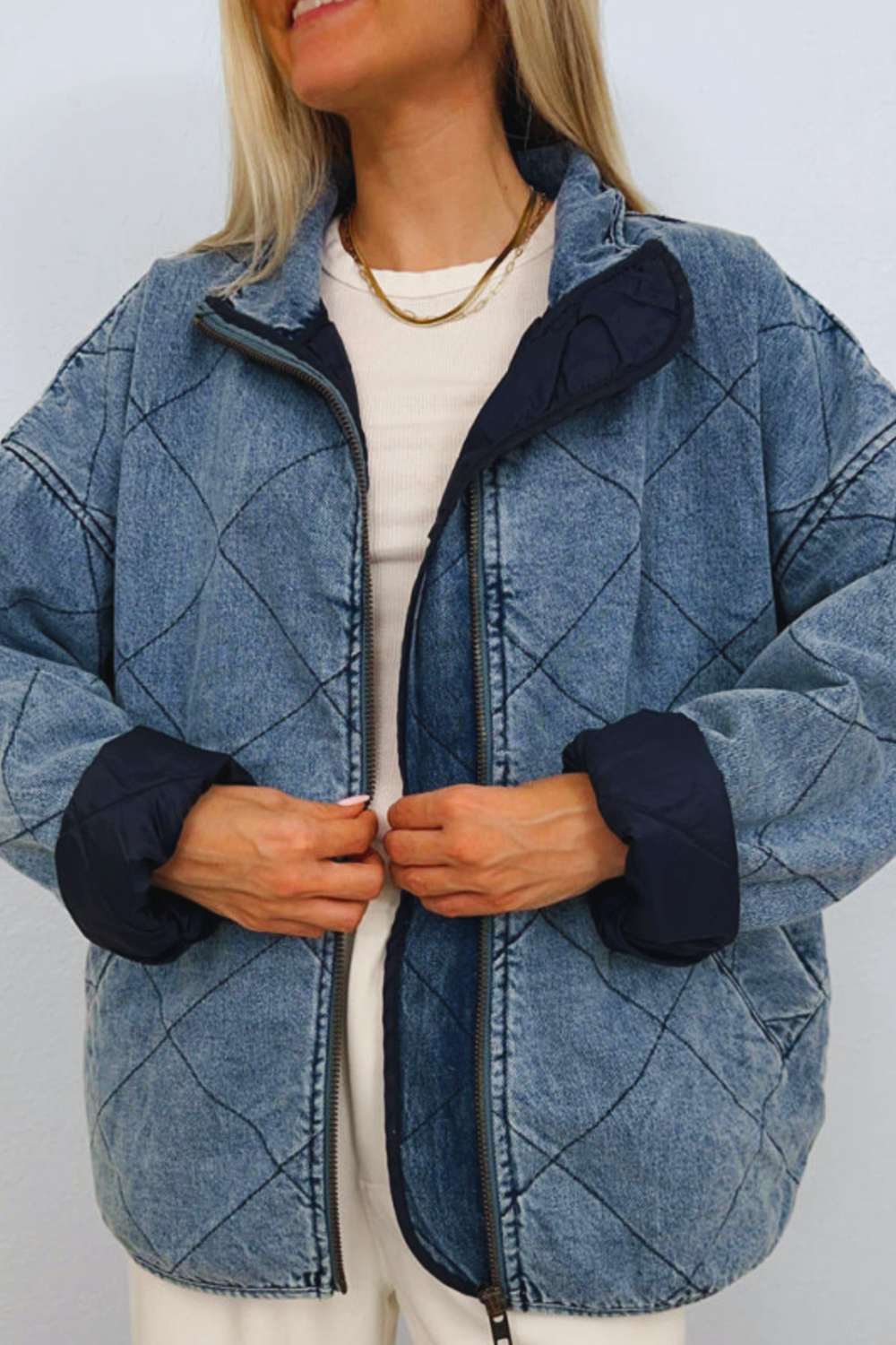 woman wearing denim jacket quilted cotton close up view