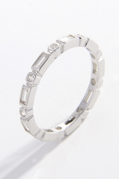 geometric ring in silver with baguette and round pattern zircon stones