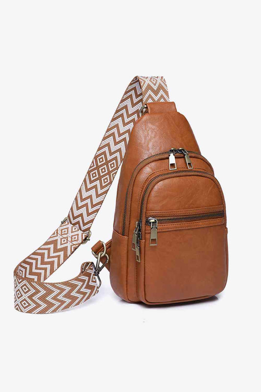 Sling travel bag in cognac color front view